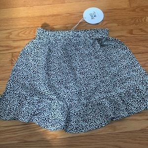 Black and White flowy skirt from Princess Polly.